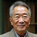 Portrait of Kenji Tanaka, a Japanese man with a discerning gaze.